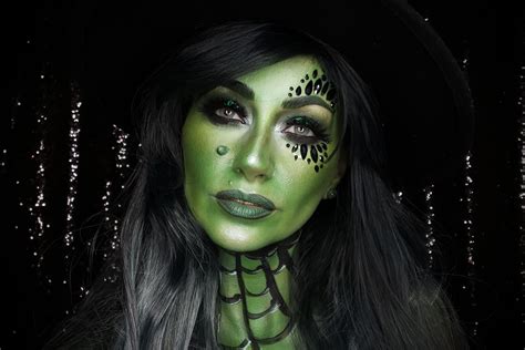 Halloween witch with a green face